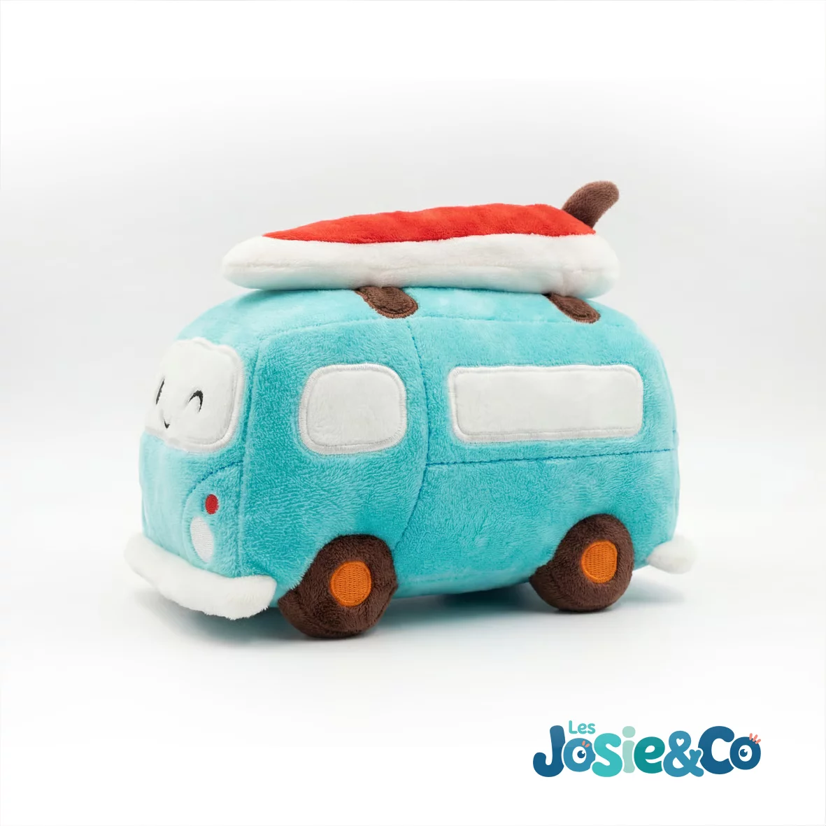 Peluche Yvan le Van de trois quarts, carrosserie turquoise, roues orange et pare-chocs blanc